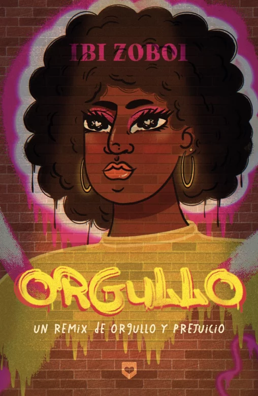 Portada del libro Orgullo: donde aparece la cara de una chica afroamericana con el pelo afro y unos pendientes grandes y dorados, pintada como un grafitti en una pared de ladrillo.